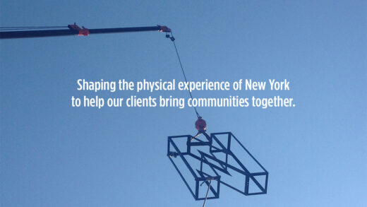 A crane lifting a large letter N with the words "Shaping the physical experience of New York to help our clients bring communities together." overlaid.